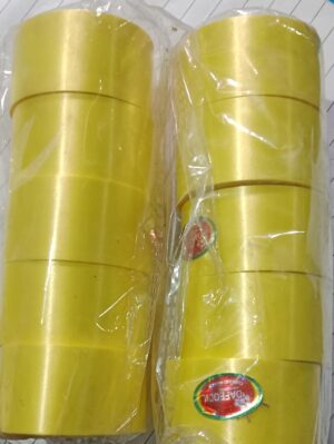 __ YELLOW COLOUR SATIN PLASTIC CURLING RIBBONS 1 INCH MRP 25 RACK A4