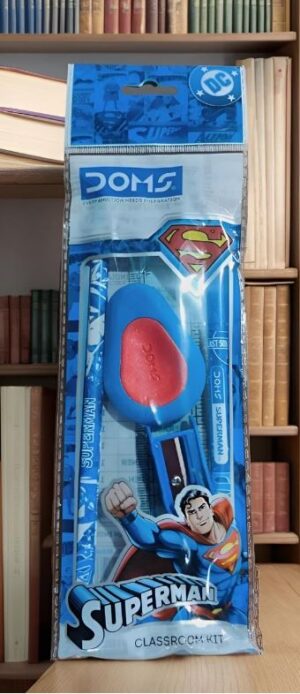 Blue DC Superman glass rock kit packaging on a shelf, featuring Superman graphic and a red molded rock inside the plastic window.