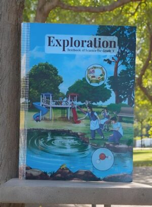 Blue science textbook titled 'Exploration: Textbook of Science for Grade 9' leaning against a tree in a park, with a playground and pond illustrated on the cover.