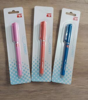 Three pastel-colored gel pens in white blister-pack packaging labeled COMET, in pink, orange, and blue on a wooden桌 surface.