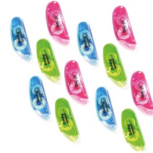 Set of translucent highlighters in pink, blue, and green colors scattered on white background