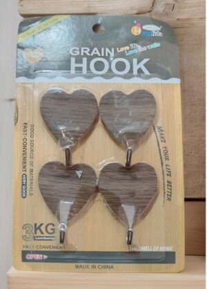 Set of four dark wood heart-shaped hooks mounted on a light wood backing inside plastic packaging, labeled 'GRAIN HOOK'.