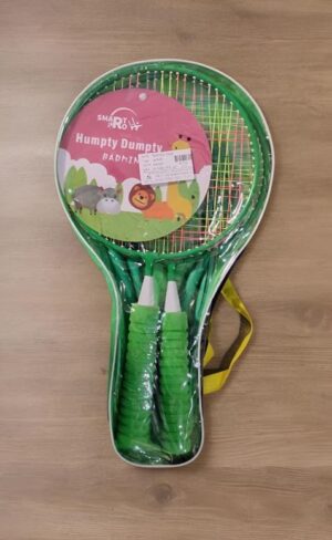 Kids' badminton racket set in a clear carrying case, featuring two green rackets with matching grips and a yellow shoulder strap, still in packaging with a pink label.