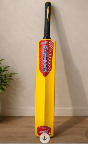 Yellow Smashers toy cricket bat leaning against a beige wall indoors, with a plant nearby.