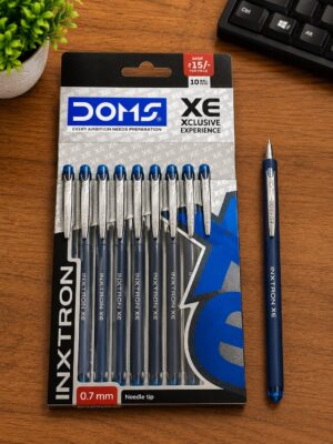Pack of 10 blue INKTRON XE ballpoint pens (0.7 mm) in a display package on a wooden desk, with a matching blue pen nearby and a keyboard in the top-right corner.