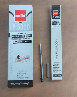 Two Cello LP 5000 ink refill boxes with a pen nib and cap on a wooden table.