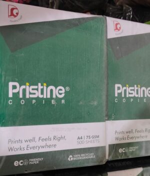 Two green Pristine Copier paper boxes with logo text, slogan 'Prints well, Feels Right, Works Everywhere,' and eco-friendly/recycled labels.