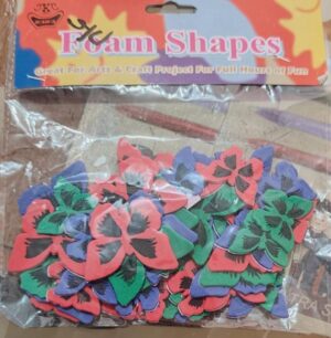 Bag of multicolored foam flower shapes (red, green, blue, black) for arts and crafts, labeled 'Foam Shapes'