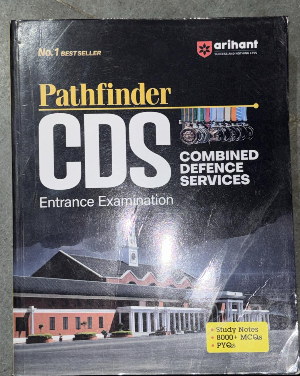 Cover of a Pathfinder CDS entrance examination study book by Arihant, featuring bold 'CDS' text and a campus building image with medals.