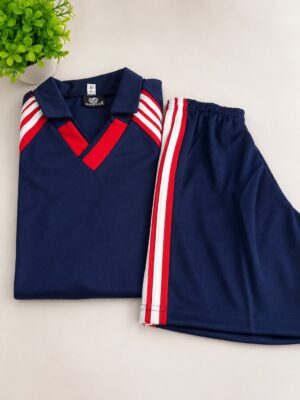 Navy athletic tracksuit set with red and white stripes, folded top and matching shorts on a light surface.