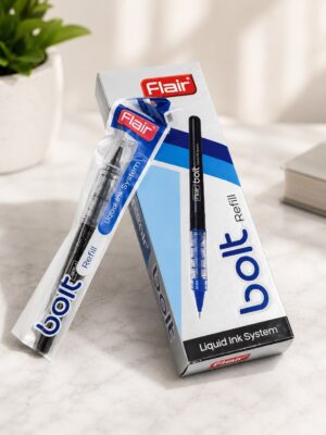 Flair branded ink pen and refill package leaning against a white box on a light surface, emphasizing the product design and branding.
