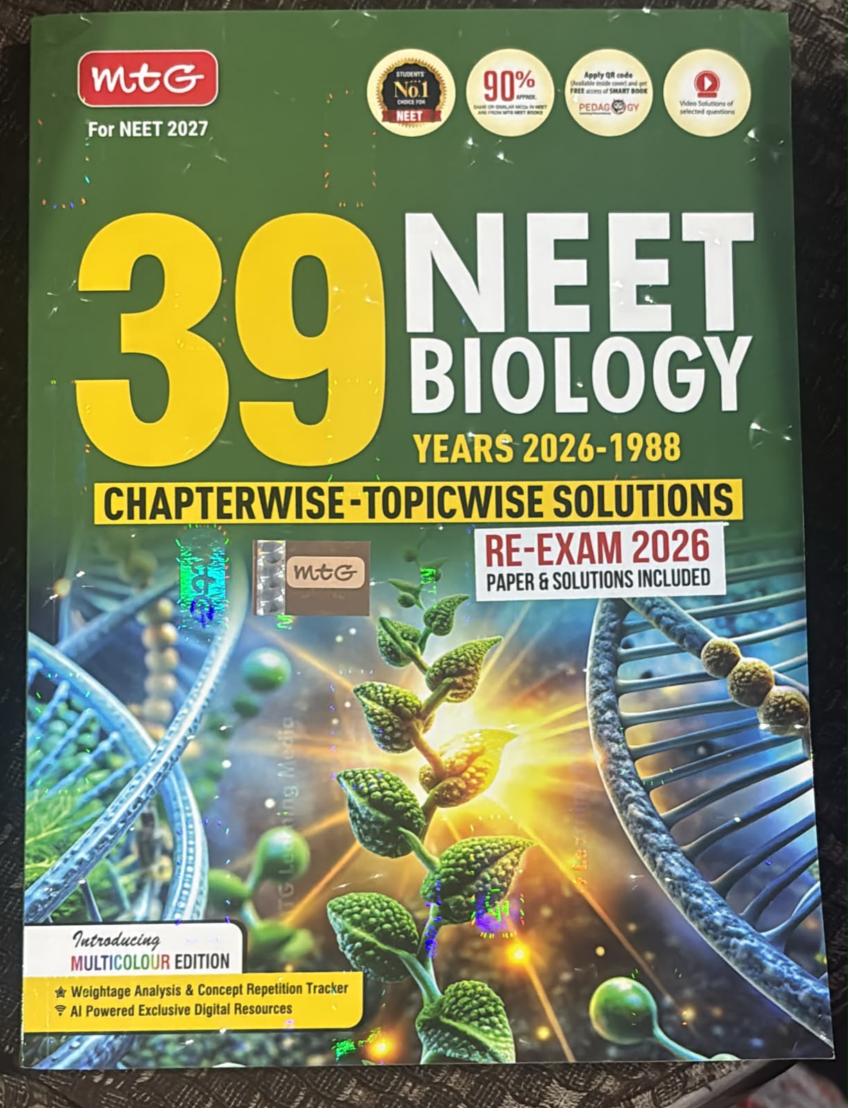 Green MTG NEET Biology 39 cover with large yellow '39' and 'NEET BIOLOGY' text, DNA imagery and 'Chapterwise-Topicwise Solutions' banner.