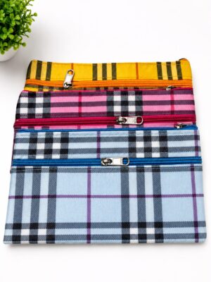 Stacked plaid zipper pouches in yellow, pink, blue, showing multiple compartments and metal zippers on a white background