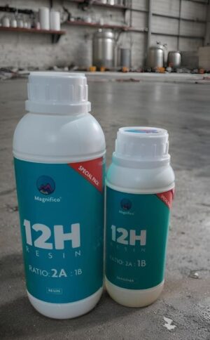 Two white bottles with teal 12H Resin labels in a workshop, different sizes in a special pack set of resin pieces nearby.