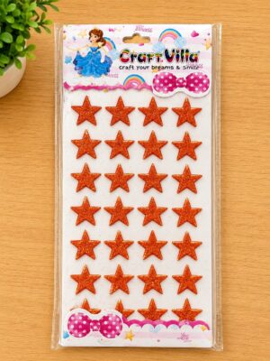 Sheet of orange glitter star stickers on Craft Villa packaging, arranged in rows on a white backing with princess and bow graphics at the top and bottom.