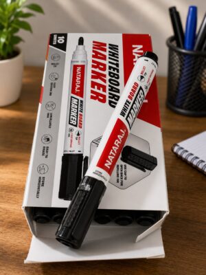 Box of Nataraj whiteboard markers with a marker resting diagonally on a wooden desk surface