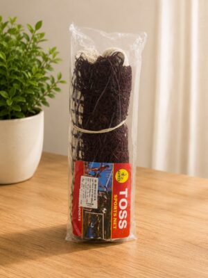 Plastic-wrapped rope dog toy with burgundy and natural rope strands on a wooden table, labeled Toss Sports Net in red packaging.