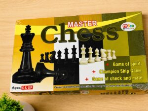 Master Chess product box showing large black king and white pieces on a yellow-green checker background with bold title text on the cover.