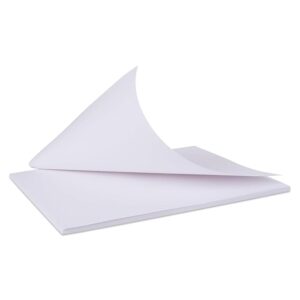 Stack of white sheets of paper with one page curling upward, resting on a smooth surface