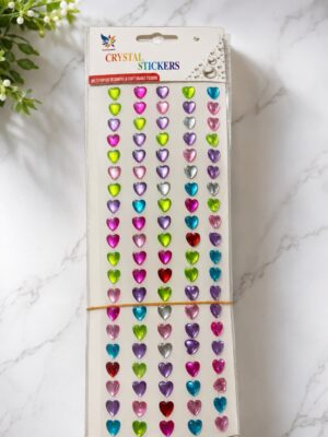 Pack of crystal heart stickers in rainbow colors arranged in vertical rows on a white backing card labeled Crystal Stickers.