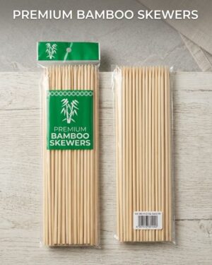 Two bundles of bamboo skewers in clear plastic packaging on a light wooden surface; left package has a green label reading 'Premium Bamboo Skewers'.